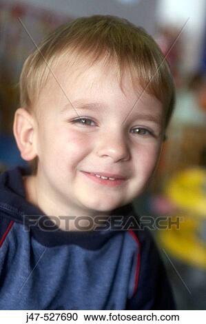 Headshot of a 3 year old boy looking into camera at nursery, View Large Photo Image Stock Image - Headshot of a 3 year old boy looking into camera at nursery,. Fotosearch