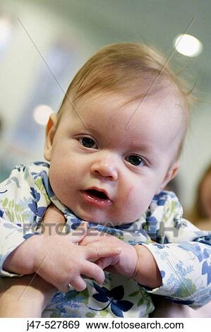 Headshot of a 6 week old baby, gazing into camera View Large Photo Image Stock Photo - Headshot of a 6 week old baby, gazing into camera. Fotosearch
