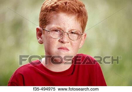 Headshot of Angry Redhead boy with Glasses View Large Photo Image Stock Photography - Headshot of Angry Redhead boy with Glasses. Fotosearch