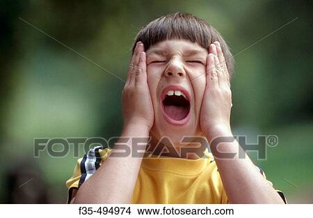 Headshot of boy having a temper tantrum View Large Photo Image Picture - Headshot of boy having a temper tantrum. Fotosearch