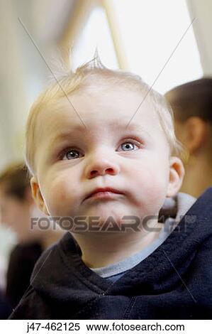 Headshot of little boy looking up View Large Photo Image Stock Photography - Headshot of little boy looking up. Fotosearch