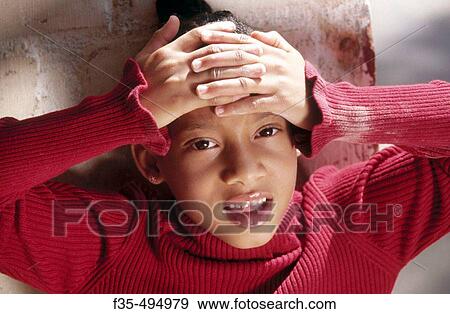 Headshot of Young Black Girl with clasped hands. View Large Photo Image Stock Photo - Headshot of Young Black Girl with clasped hands.. Fotosearch