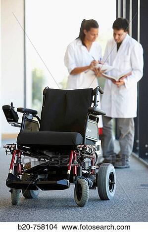 Picture - Health and Quality of life Unit researchers developing a control system for intelligent power wheelchair, FIK technology research program for aged and disabled people. Fatronik-Tecnalia, Research and Technology Center, Donostia, Basque Country, Spain. Fotosearch