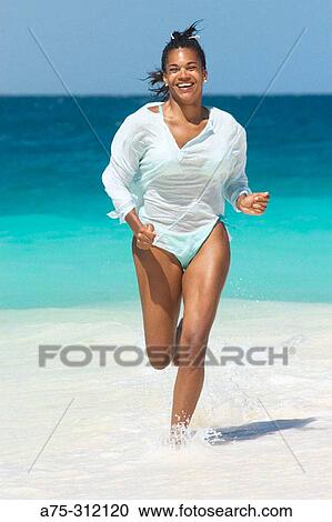 Stock Image - healthy woman running. Fotosearch