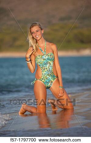 Healthy young woman at the beach View Large Photo Image Stock Image - Healthy young woman at the beach. Fotosearch