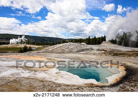 Heart Spring in Yellowstone's Upper Geyser Basin with the Lion Geyser Group and Castle Geyser erupting in the background. View Large Photo Image Stock Photo - Heart Spring in Yellowstone's Upper Geyser Basin with the Lion Geyser Group and Castle Geyser erupting in the background.. Fotosearch