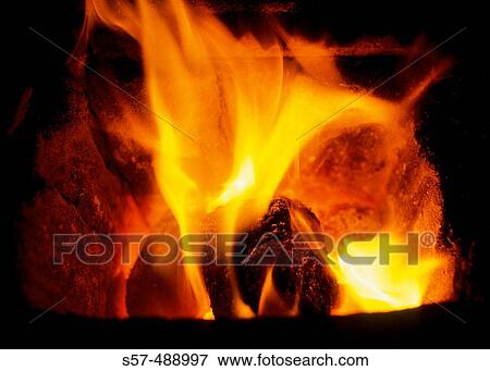 Heat, flame, coal burner View Large Photo Image Stock Photo - Heat, flame, coal burner. Fotosearch