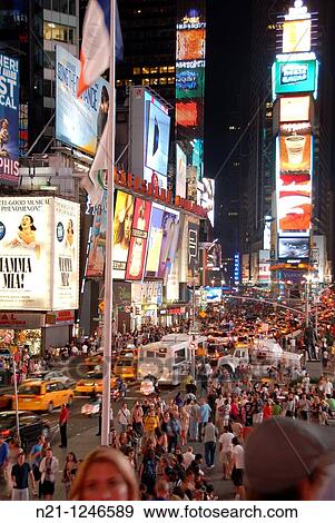 Stock Photo - Heavy traffic and crowds on Seventh Avenue from Duffy Square. Times Square. Theater District. Manhattan. New York, New York. USA.. Fotosearch