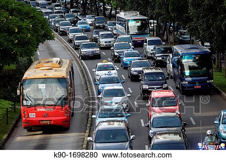 Heavy traffic seen from above on Jalan Sudirman with separated bus lane, Central Business District of Jakarta, Indonesia, Southeast Asia View Large Photo Image Stock Image - Heavy traffic seen from above on Jalan Sudirman with separated bus lane, Central Business District of Jakarta, Indonesia, Southeast Asia. Fotosearch