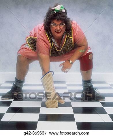 Hefty mom in football stance. View Large Photo Image Stock Photo - Hefty mom in football stance.. Fotosearch