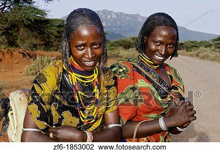 Hegrmarian Ethiopia Africa Lower Omo Valley sunset portrait of young Borena tribe girls with colorful outfits in open reserve 29 View Large Photo Image Stock Image - Hegrmarian Ethiopia Africa Lower Omo Valley sunset portrait of young Borena tribe girls with colorful outfits in open reserve 29. Fotosearch