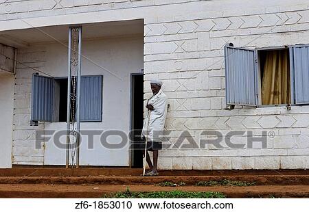 Hegrmarian Ethiopia Africa Lower Omo Valley Muslim man in white at door of building View Large Photo Image Stock Image - Hegrmarian Ethiopia Africa Lower Omo Valley Muslim man in white at door of building. Fotosearch
