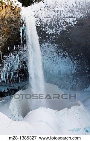 Helmcken Falls in winter, Wells gray Provincial Park British Columbia Canada View Large Photo Image Stock Photo - Helmcken Falls in winter, Wells gray Provincial Park British Columbia Canada. Fotosearch