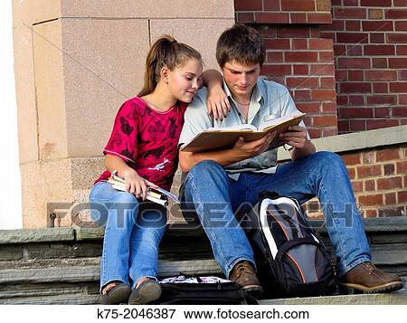 Helping each other with homework View Large Photo Image Stock Photo - Helping each other with homework. Fotosearch