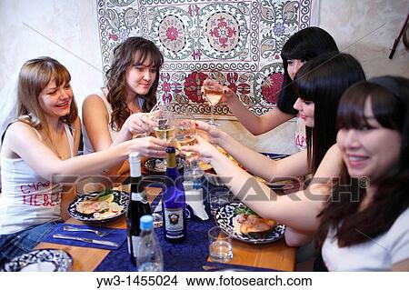 Picture - Hen-party - Portrait of pretty girls celebrating birthday in the oriental cafe. Fotosearch