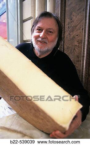 Stock Photo - Henry VOY, ma? tre-fromager. Cheese shop? La Ferme Saint-Hubert?. Rue Vignon. Paris. Fotosearch