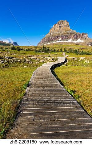 Stock Image - Hidden Lake Trail at Logan Pass under Clements Mountain, Glacier National Park, Montana USA.. Fotosearch