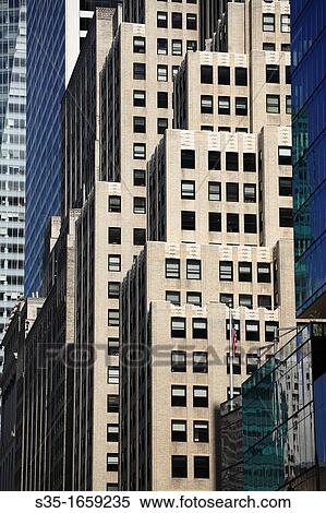 Stock Photography - High rise buildings in Midtown Manhattan New York City USA.. Fotosearch