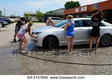 High school students wash cars to for fund raiser. View Large Photo Image Stock Photograph - High school students wash cars to for fund raiser.. Fotosearch