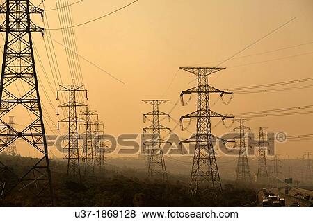 High voltage towers along the Taiwan highway at dusk. View Large Photo Image Stock Photo - High voltage towers along the Taiwan highway at dusk.. Fotosearch