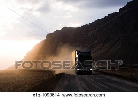 Highway 1 is a sealed road but is covered by volcanic ash from the volcanic eruption in Eyjafjallajokull glacier, South Iceland View Large Photo Image Picture - Highway 1 is a sealed road but is covered by volcanic ash from the volcanic eruption in Eyjafjallajokull glacier, South Iceland. Fotosearch