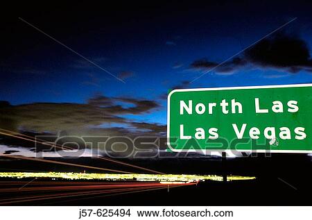 Picture - Highway sign for Las Vegas with Las Vegas in background. Nevada. USA.. Fotosearch