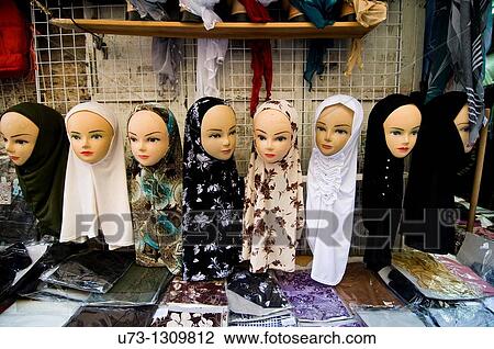 Hijabs on display in a shop in the Muslim quarter of the old city of Jerusalem. View Large Photo Image Stock Image - Hijabs on display in a shop in the Muslim quarter of the old city of Jerusalem.. Fotosearch