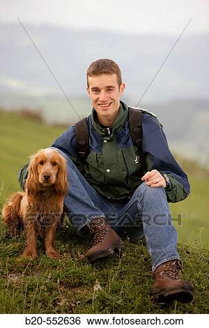 Hiker and Cocker Spaniel dog. View Large Photo Image Stock Photograph - Hiker and Cocker Spaniel dog.. Fotosearch