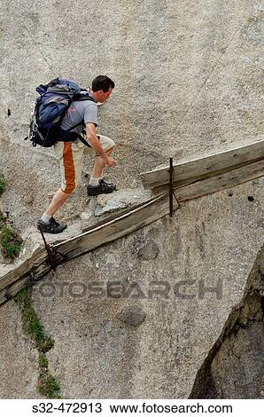 Hiker. Cavallers. Vall de Boh?. Pyrenees. Lleida province. Spain. View Large Photo Image Stock Image - Hiker. Cavallers. Vall de Boh?. Pyrenees. Lleida province. Spain.. Fotosearch