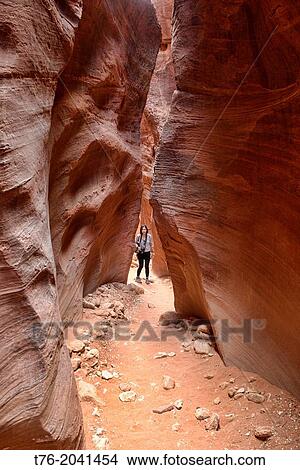 Hiker in the Buckskin Gulch slot canyon, Kanab, Utah. View Large Photo Image Picture - Hiker in the Buckskin Gulch slot canyon, Kanab, Utah.. Fotosearch