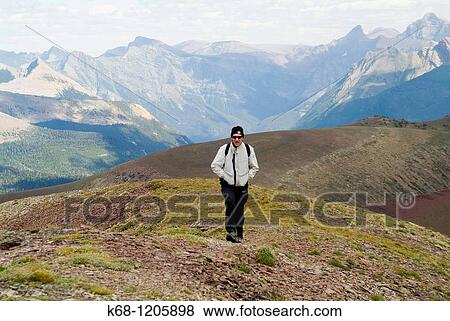 hiker in Waterton National Park, Alberta, Canada View Large Photo Image Stock Photo - hiker in Waterton National Park, Alberta, Canada. Fotosearch