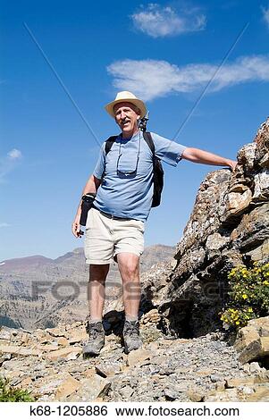 Stock Photograph - hiker on Mount Galwey, Waterton National Park, Alberta, Canada. Fotosearch