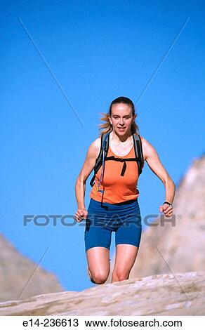 Hiker running at Zion National Park. Utah. USA View Large Photo Image Stock Image - Hiker running at Zion National Park. Utah. USA. Fotosearch