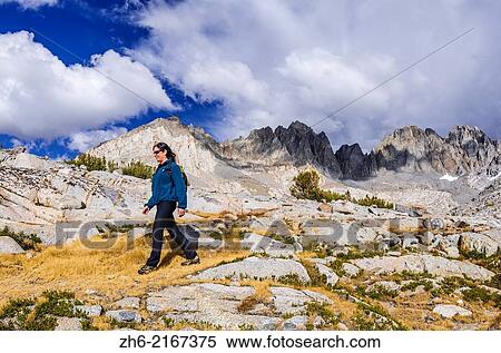 Hiker under the Palisades in Dusy Basin, Kings Canyon National Park, California USA. View Large Photo Image Stock Photography - Hiker under the Palisades in Dusy Basin, Kings Canyon National Park, California USA.. Fotosearch