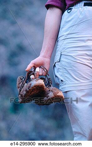 Hiker with muddy boots. Utah, USA View Large Photo Image Stock Image - Hiker with muddy boots. Utah, USA. Fotosearch