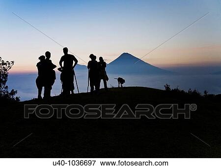 Hikers at sunset View Large Photo Image Stock Photo - Hikers at sunset. Fotosearch