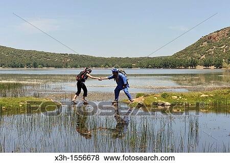 hikers by the Dayet Aoua lake, around Ifrane, Middle Atlas, Morocco, North Africa View Large Photo Image Stock Photo - hikers by the Dayet Aoua lake, around Ifrane, Middle Atlas, Morocco, North Africa. Fotosearch
