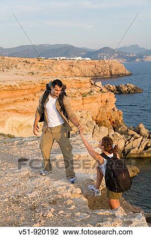 Hikers in the cliff View Large Photo Image Stock Image - Hikers in the cliff. Fotosearch