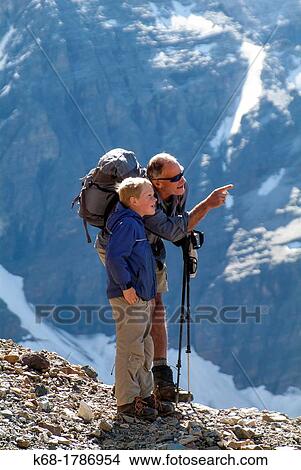 Picture - Hikers near Lake O? Hara in Yoho National Park, British Columbia, Canada Lake O? Hara is one of the most popular hiking areas in the Canadian Rockies. Fotosearch