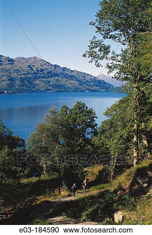 Hikers on the way along Loch Ness. Highlands. Scotland View Large Photo Image Stock Image - Hikers on the way along Loch Ness. Highlands. Scotland. Fotosearch
