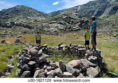 Hikers restiing in Navamediana Valley, Sierra de Gredos Regional Park? vila province Castilla y Le? n Spain View Large Photo Image Stock Photo - Hikers restiing in Navamediana Valley, Sierra de Gredos Regional Park? vila province Castilla y Le? n Spain. Fotosearch