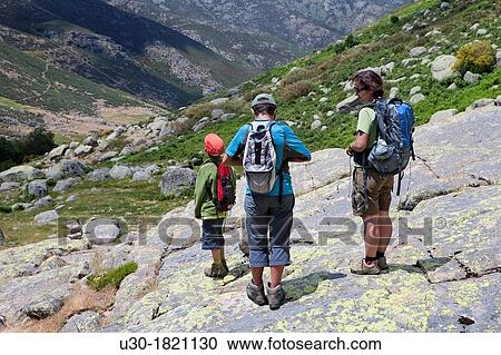 Hikers walking along Navamediana Valley in Sierra de Gredos Regional Park? vila province Castilla y Le? n Spain View Large Photo Image Stock Image - Hikers walking along Navamediana Valley in Sierra de Gredos Regional Park? vila province Castilla y Le? n Spain. Fotosearch