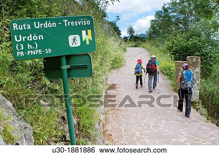 Hikers walking down from Tresviso, a small village in Picos de Europa National Park by historic Urd? n path to La Hermida Gorges Pearrubia Cantabria, Spain View Large Photo Image Stock Photograph - Hikers walking down from Tresviso, a small village in Picos de Europa National Park by historic Urd? n path to La Hermida Gorges Pearrubia Cantabria, Spain. Fotosearch