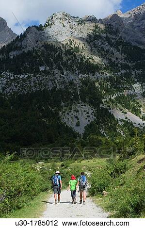 Hikers walking in Pineta valley Ordesa y Monte Perdido National Park Biosphere Reserve of Ordesa-Viamala Bielsa Huesca Arag? n Spain View Large Photo Image Stock Image - Hikers walking in Pineta valley Ordesa y Monte Perdido National Park Biosphere Reserve of Ordesa-Viamala Bielsa Huesca Arag? n Spain. Fotosearch