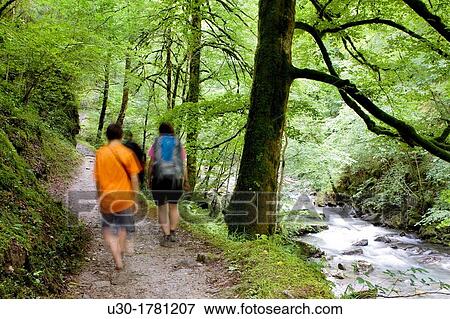 Hikers walking to Gorges d? Holzarte, near Larrau village, Atlantics Pyrenees, in Aquitaine region France View Large Photo Image Stock Photo - Hikers walking to Gorges d? Holzarte, near Larrau village, Atlantics Pyrenees, in Aquitaine region France. Fotosearch