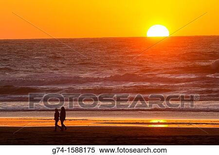 Hikiers on beach at Sunset San Francisco, California USA View Large Photo Image Stock Photography - Hikiers on beach at Sunset San Francisco, California USA. Fotosearch
