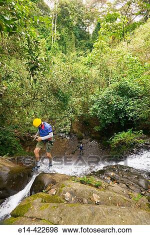 Hiking, Costa Rica, Turrialba, canopy tour, jungle zip line, waterfall rapel View Large Photo Image Stock Photo - Hiking, Costa Rica, Turrialba, canopy tour, jungle zip line, waterfall rapel. Fotosearch