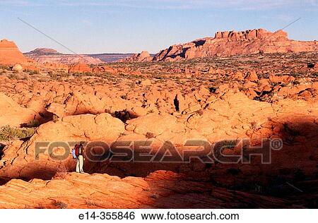 Hiking. Coyote Buttes, Paria Wilderness. Arizona. USA. View Large Photo Image Stock Photograph - Hiking. Coyote Buttes, Paria Wilderness. Arizona. USA.. Fotosearch