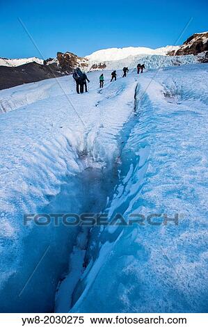 Hiking on Fallsjokull glacier in Iceland. View Large Photo Image Stock Photography - Hiking on Fallsjokull glacier in Iceland.. Fotosearch
