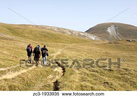 Hiking on the plateau of Emparis, Massif de l? Oisans, near the natural park of les Ecrins, Is? re, Rh? ne-Alpes, France. View Large Photo Image Stock Photography - Hiking on the plateau of Emparis, Massif de l? Oisans, near the natural park of les Ecrins, Is? re, Rh? ne-Alpes, France.. Fotosearch